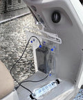 Top Shelf Waterproof Charging Cover For Electric Scooters And Ebikes clear rainproof guard shown over charging port with wet surface.