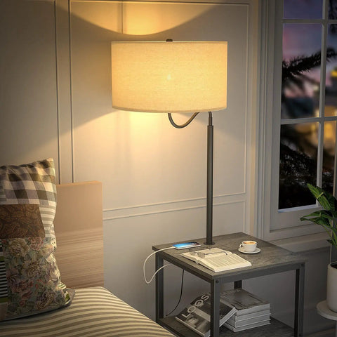 Dope Industrial Floor Lamp With Side Table And USB Port beside bed, lit lamp and charging phone, modern decor in living room