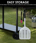 Front view of 12-inch aluminum perforated pizza peel with hanging hook for outdoor pizza oven use.