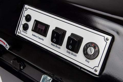 Control panel of the Top Shelf Electric Floor Sweeper Workhorse with brush switches and battery display.