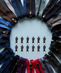 12 Piece Universal Zipper Repair Kit With Stainless Steel Sliders And Pullers For Jackets Bags Backpacks And Outdoor Gear Durable Quick Install Zipper Fasteners In Black arranged in a circle with various zipper colors
