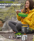 Woman using Lightweight Backpacking Camping Cookware Set With Foldable Handles 0.33 Gal Pots 0.17 Gal Pans outdoors