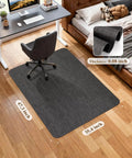 Big Non Slip Office Chair Mat For Hardwood Floors 35.4 X 47.2 Inches Heavy Duty PVC Floor Protector For Rolling Desk Chair Easy Glide With Rattan Pattern Black Home Office Rug Pad installed under desk chair in home office setting.