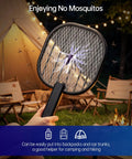 Ultimate 3500V Bug Zapper Handheld Electric Fly Swatter With 5 Layer Protection Grid used outdoors near campsite