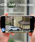 Phone displaying 1080p footage from 2 Pack Outdoor Security Cameras With Auto Spotlight And Color Night Vision, AI features visible.