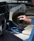 Person fitting L4 Tire Inflator Portable Air Compressor 150 PSI On The Go With Pressure Gauge And LED Light into car console