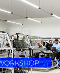 Brightly lit workshop with Boss Level Bright Four Foot LED Shop Lights 84W 10000 Lumens Daylight 5000K installed overhead