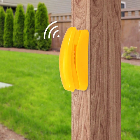 Yellow telephone attachment on a wooden swing set post, part of kids outdoor playground accessories swingset attachments set.