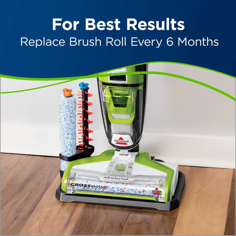 Front view of BISSELL CrossWave multi-surface pet brush roll on a green-gray base with blue and red brushes nearby.