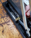 Model 855 Hose Ferrule Crimping Tool for Universal Fit, shown in heavy duty steel construction on workshop table.