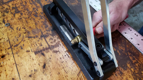 Model 855 Hose Ferrule Crimping Tool for Universal Fit, shown in heavy duty steel construction on workshop table.