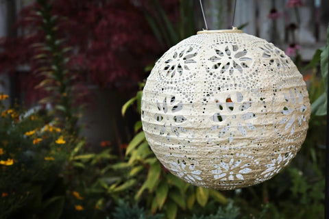 LED Outdoor Solar Lantern For Patio And Deck Handmade Tyvek Weather Resistant UV Rated Stainless Steel Hardware Auto Sensor On Off Energy Efficient Garden Light That Is Lit In Pearl hanging in garden