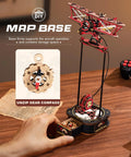 3D Wooden Puzzle For Grownups Gravity Swing Model Kit with biplane resting on a DIY map base, showing drawer with gear compass.