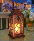 Two Pack 14 Inch Solar Lantern For Outdoor Garden Hanging Use Waterproof LED Flickering Flameless Candles on table