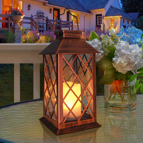 Two Pack 14 Inch Solar Lantern For Outdoor Garden Hanging Use Waterproof LED Flickering Flameless Candles on table