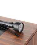 Ultraviolet Blacklight Flashlight With 51 LEDs, 395 Nanometer UV Light resting on wooden surface