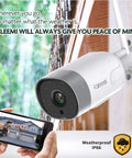 Mounted Outdoor WiFi Security Cam 1080p With Night Vision And Motion Detection, viewed on smartphone, against rainy backdrop
