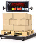 Pallet with boxes on 24 By 24 Inch Industrial Floor Scale With Heavy Duty Diamond Plate Platform And Digital Indicator.