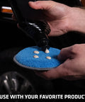 Applying wax to blue microfiber pad from Four Pack Five Inch Blue And Gray Microfiber Polishing Pads For Car Detailing