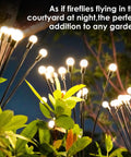 8 Pack 64 LED Solar Firefly Garden Lights Waterproof Outdoor Swaying Fairy Lights illuminating a garden at night