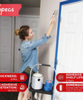Person using Blue Painter Tape 2 Inch By 60 Yards Bulk 12 Roll Pack with Sharp Edge Line Technology on door for clean lines.