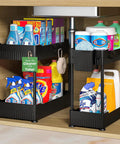 Total Game Changer Two Pack Under Sink Cabinet Organizer Rack With Sturdy Hooks And Hanging Cup To Slap Order On Messy Closets For Cleaners Bottles And Kitchen Goods holding cleaners under a sink.