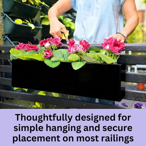 Top Shelf 16 Inch Black Metal Railing Planters Two Pack Rectangular Hanging Flower Boxes on railing with flowers.