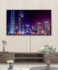 Wall Cord Cover Kit For TV Setup, 32 Inch Long Paintable Cable Concealer hides wires on wall beneath mounted TV in living room.
