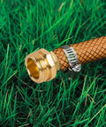 5/8 Inch Aluminum Garden Hose Repair Kit with Female Connector and Clamp on Grass