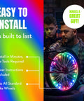 Light Up Your Ride With LED Bike Wheel Lights With Batteries Included Stay 100 Percent Brighter And Visible From Every Angle For Maximum Safety And Style Dope Multicolor Wheel Lights For One Tire Pack, easy installation, two people installing on a bike wheel.