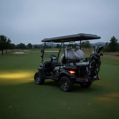 Sleek Black 4-Seater Electric Golf Cart With Raised Stance, Heavy Duty Shocks, Plug And Play Charging, Flex Cargo Trunk, 44 Mile Range Weekend Warrior Build For Parks And Hotel Runs parked on green grass.