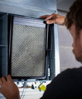 Person installing 35 Water Panel Humidifier Filter Replacement For Easy No Fuss Home Humidification Fits Whole House Units 300 350 360