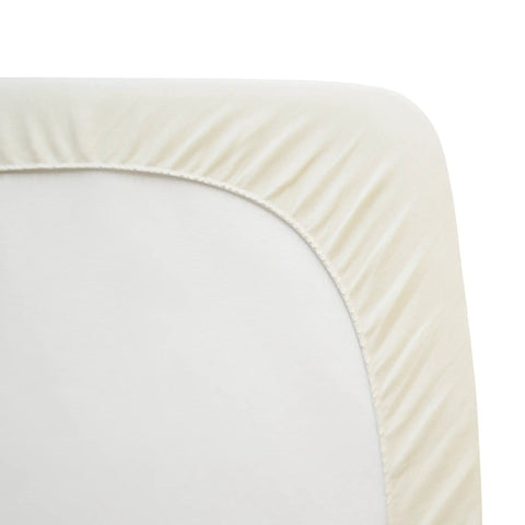 Close-up of the Spillproof Waterproof Crib And Toddler Mattress Protector With Quilted Organic Cotton Top Layer fitted corner view