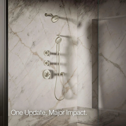 Purist Single Function Showerhead With 1.75 GPM Flow, Vibrant Brushed Nickel Finish in elegant bathroom setting.