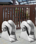 Heavy Duty Stainless Steel V Groove Gate Track Roller For Sliding Gates With Double Bearing Wheels Set Of 2 in front of gate