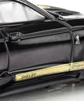 Close-up of Ford Shelby Mustang GT500H Mega G Plus HO Slot Car Black And Gold King Of The Road Edition side detail