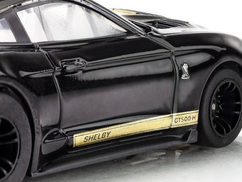 Close-up of Ford Shelby Mustang GT500H Mega G Plus HO Slot Car Black And Gold King Of The Road Edition side detail