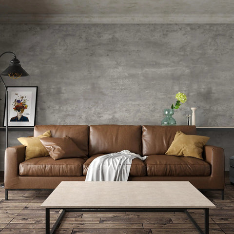 Living room with a brown sofa against 24 By 354 Inch 3D Wide Concrete Wallpaper Peel And Stick Self Adhesive Vinyl Wrap in light grey