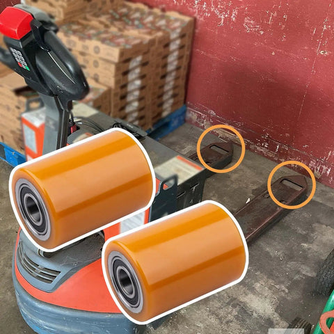 Premium GYUPTRK Load Wheel Kit For Toyota 8HBW23 Electric Pallet Jack Truck displayed with polyurethane wheels beside pallet jack.