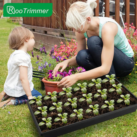 Woman and child using Seed Starter Kit With 10 1020 Seed Trays And 2 Seedling Heat Mats For Faster Germination In Indoor Gardens And Greenhouses
