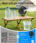Eight Inch Portable Misting Fan With Secure Clip Mount Heavy Duty Battery Operated Cooling Setup next to water bottles and bucket.