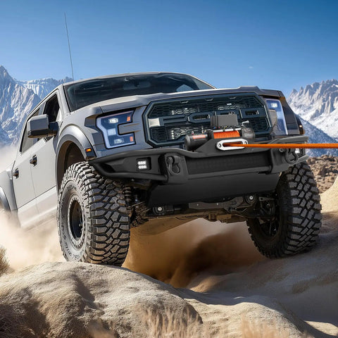 Truck using Beefy 13,500 Lb Electric Winch For Off Road Rigs And Trucks 12V DC Three Eighths Inch X 80 Ft Synthetic Rope in desert