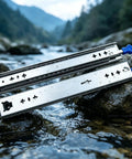 Heavy Duty Side Mount Drawer Slides Double Ball Steel Track Built Tough As Nails With Bidirectional Locking For Bedroom Drawers resting on wet stones near a river.