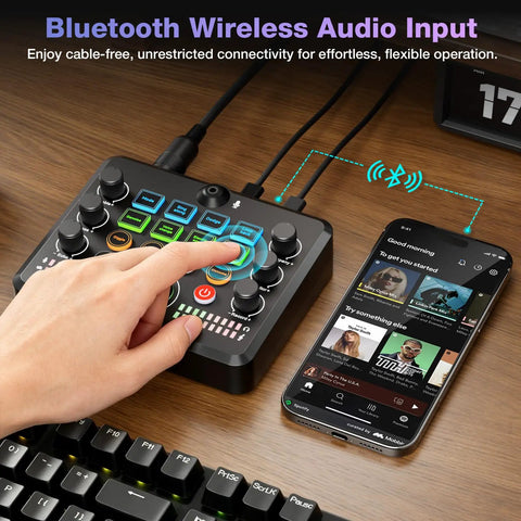 Using the All In One Live Sound Card Mixer With Gooseneck Mic And Voice Changer For Streaming Gaming And Recording On Phone PC And Laptop Bluetooth DSP Reverb Noise Reduction next to a smartphone.