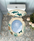 Teal Resin Toilet Seat for Bathroom with marine life design, installed over a toilet, showing coral and turtle details.