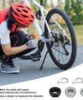Cyclist using Durable Carbon Steel Bike Hub Nut And Safety Washer Kit with M8 M9.5 M10 for mountain bike wheel installation.