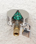 Stainless steel heavy duty outdoor faucet lock cover with padlock for standard hose bibs, installed, preventing unauthorized use and theft.