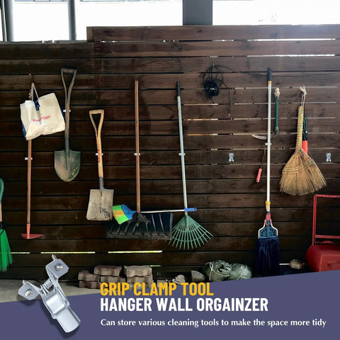 Heavy Duty Metal Spring Clip Hangers 30 Pack Wall Mount Organizer For Garage Holds Brooms Mops Rakes And Tools Up To 1.78 Inch Diameter With Mounting Screws Included For Easy Installation on wooden wall with tools