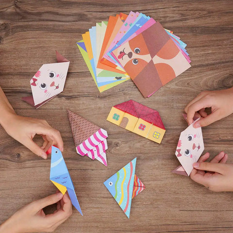 Children using Origami Kit For Kids Ages Five To Twelve With Guiding Book 98 Double Sided Sheets And 47 Pattern Designs 14 By 14 Cm Paper For Beginners Craft Projects And An Awesome Gift For School to fold animals and shapes