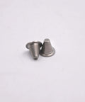 Close-up of two stainless steel witches-hat short-stop waterjet filter cones with perforations.